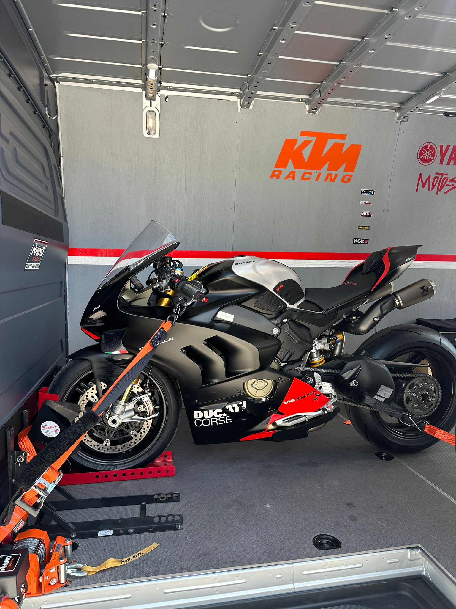 motorcycle transport london loading bike into enclosed van